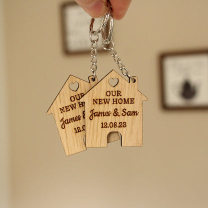 2x 'Ons nieuwe huis' gepersonaliseerde sleutelhangers