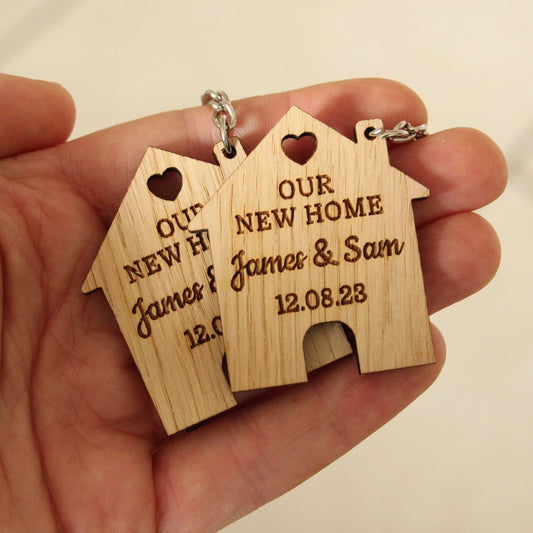 2x porte-clés personnalisés ''Notre nouvelle maison''